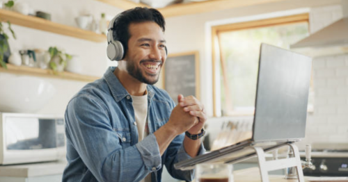how to manage employee burnout during the holiday season man smiling